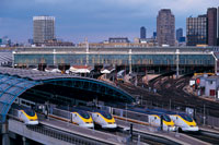 Bullet trains at an urban station