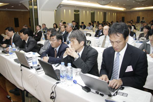 View of the conference room filled with participants