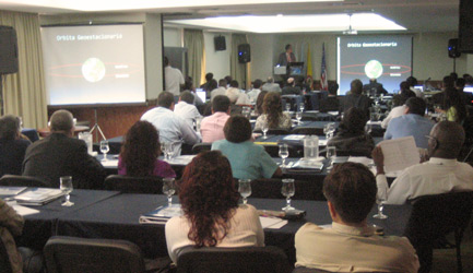 View of the conference room filled with participants