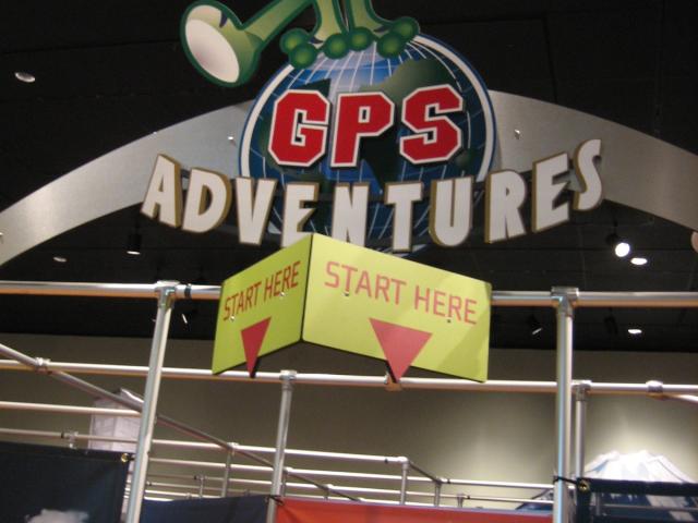 GPS Adventures Exhibit with a Start Here sign and arrow.