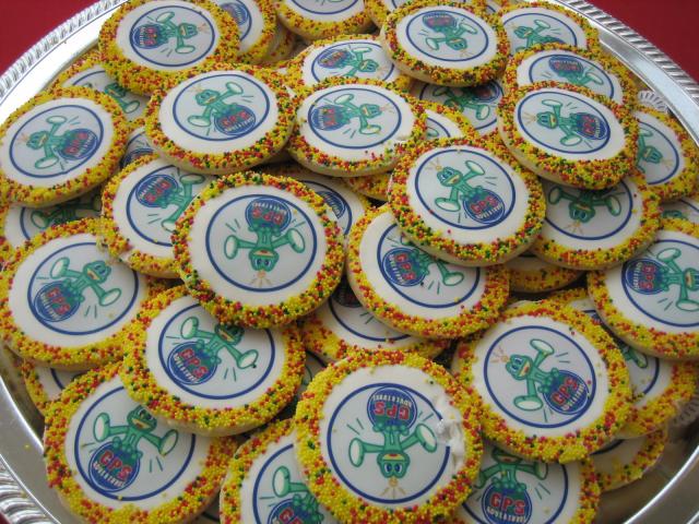 A plateful of cookies decorated with the GPS Adventures logo.