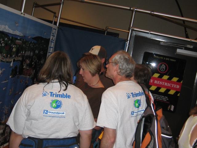People standing in front of part of the exhibit.