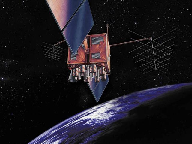 Illustration of the GPS Block IIR satellite in space with the Earth in the background.