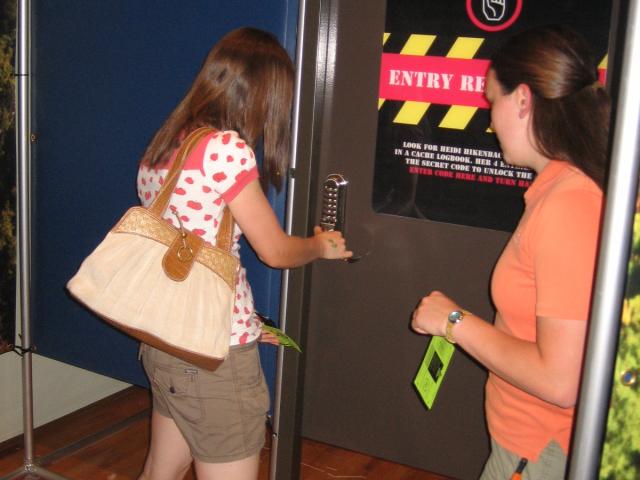 Someone opens a locked door with a keypad, labeled Satellite 2: The Great Outdoors